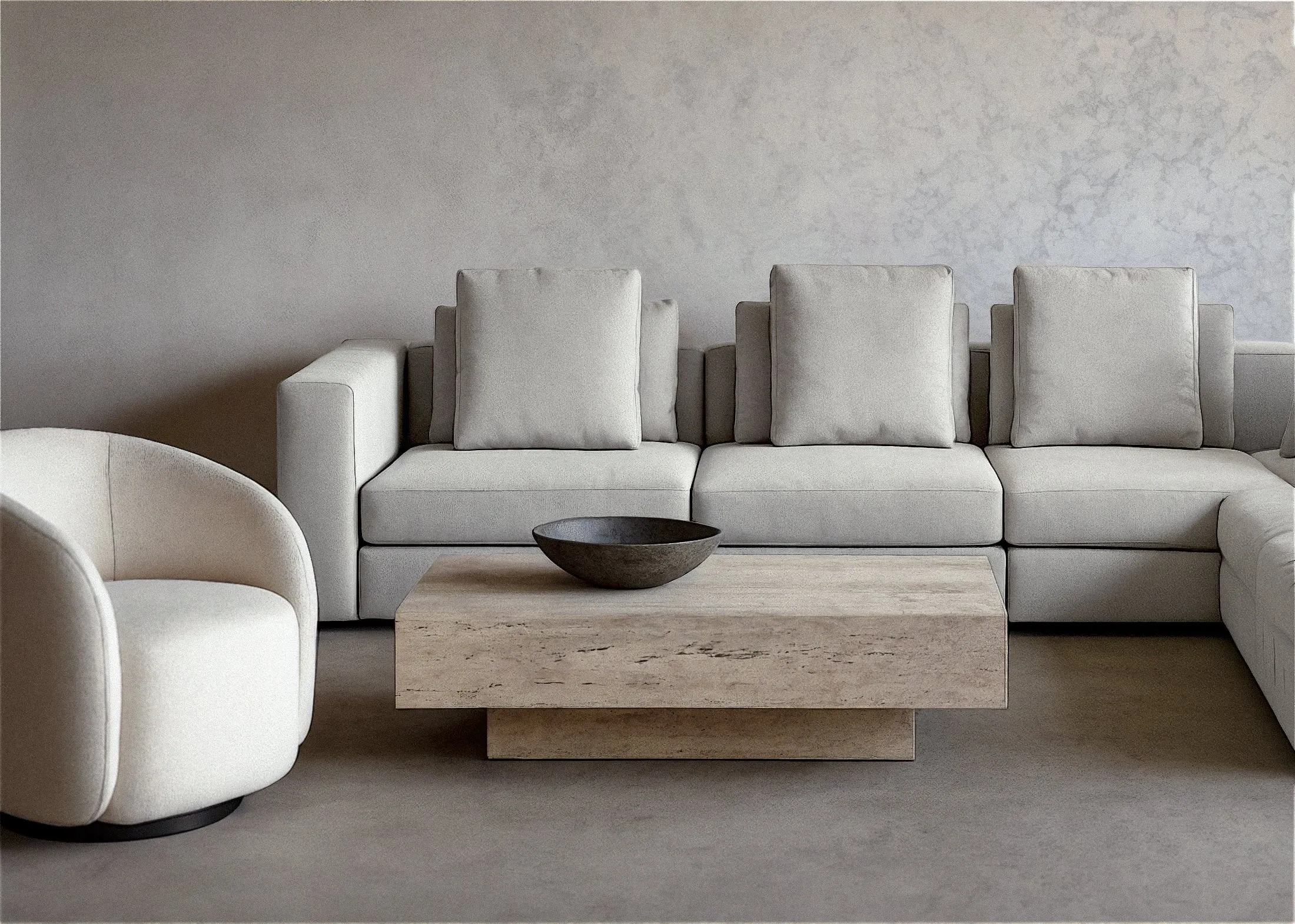 Living room scene with modular sofa, lounge chair, and travertine coffee table