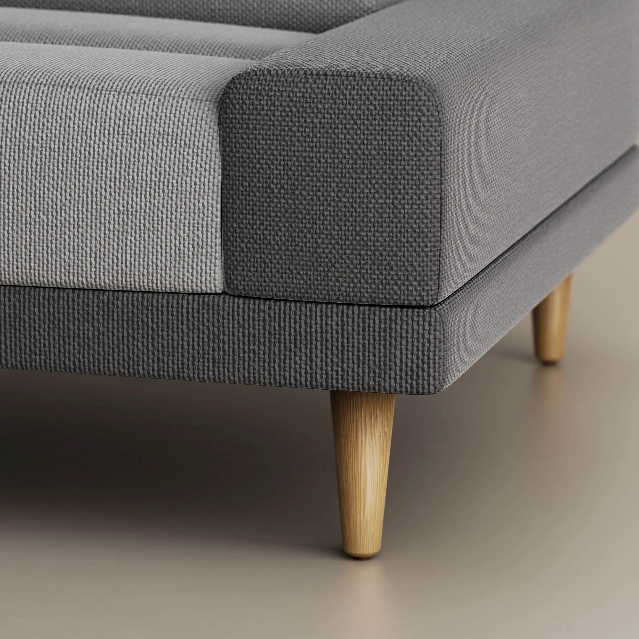 Malmo sofa bed — armrest and tapered wooden leg detail